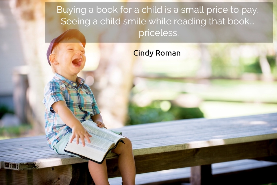 1563849719481-buying-a-book-for-a-child-is-a-small-price-to-pay-seeing-a-child-smile-while-reading.jpg