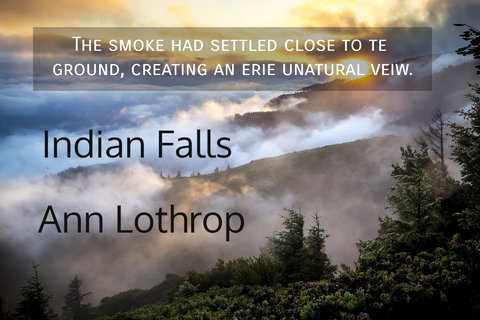 the smoke had settled close to te ground creating an erie unatural veiw...